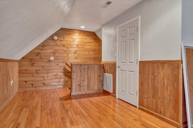 5335 Catawba Valley Dr, Catawba, VA 24070 - bonus room with wooden walls, light wood finished floors, lofted ceiling, and a wainscoted wall