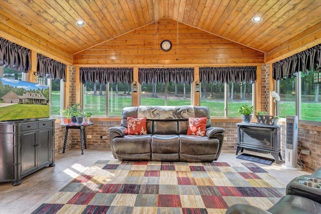 5335 Catawba Valley Dr, Catawba, VA 24070 - sunroom with vaulted ceiling, plenty of natural light, and a wood stove