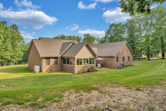 5335 Catawba Valley Dr, Catawba, VA 24070 - back of property featuring brick siding, a yard, a patio, and crawl space