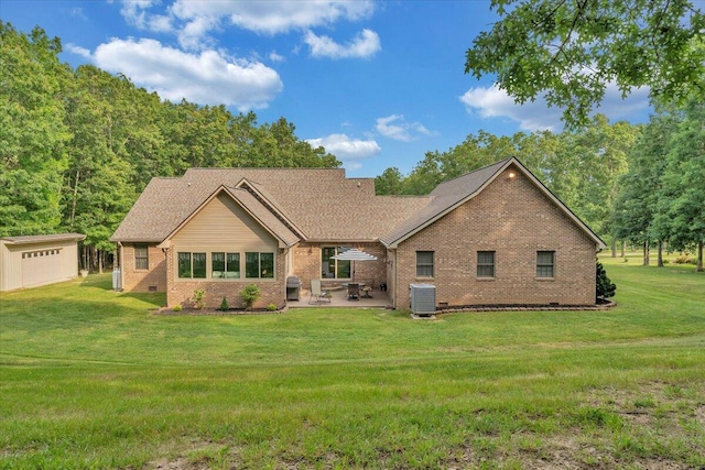 5335 Catawba Valley Dr, Catawba, VA 24070 - rear view of property with brick siding, a patio, a yard, and an outdoor structure