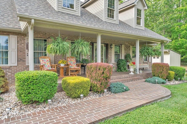 5335 Catawba Valley Dr, Catawba, VA 24070 - entrance to property with covered porch, brick siding, and roof with shingles