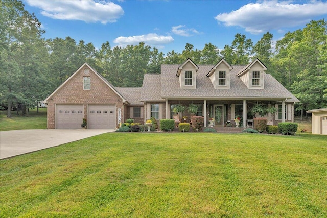 5335 Catawba Valley Dr, Catawba, VA 24070 - cape cod-style house with driveway, a front lawn, brick siding, and roof with shingles