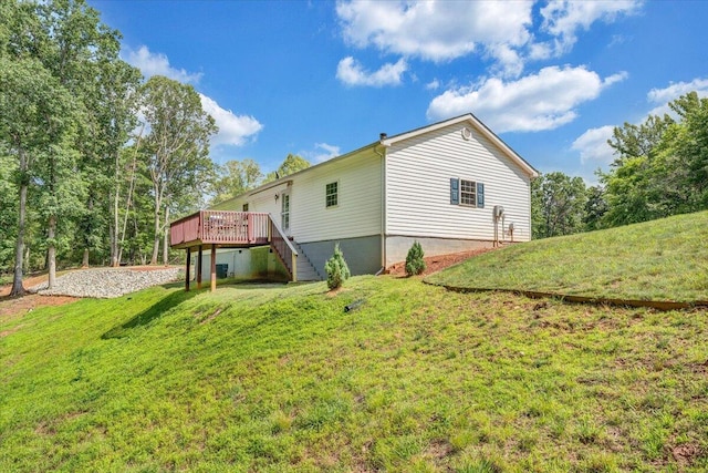 139 Lynville Dr, Hardy, VA 24101 - rear view of property featuring a wooden deck, stairway, and a yard