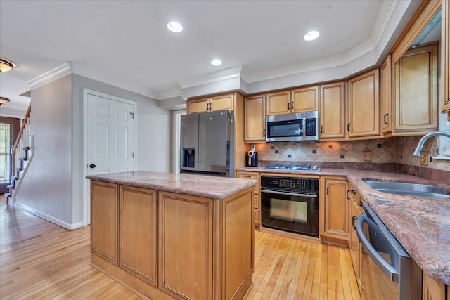 6061 Chagall Dr, Roanoke, VA 24018 - kitchen with stainless steel appliances, light wood-style floors, crown molding, a center island, and light stone counters