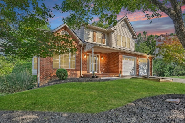 6061 Chagall Dr, Roanoke, VA 24018 - traditional-style house with a lawn, brick siding, an attached garage, and driveway