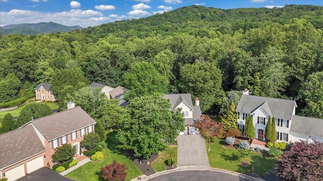 6061 Chagall Dr, Roanoke, VA 24018 - aerial perspective of suburban area featuring a forest and mountains