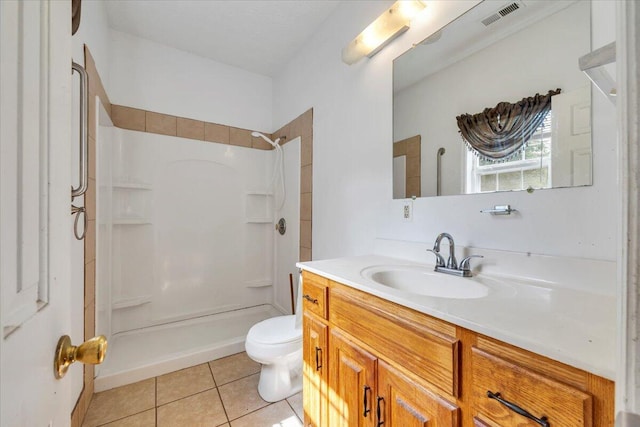 60 Tara Dr, Ridgeway, VA 24148 - full bath with toilet, a shower, vanity, and tile patterned flooring