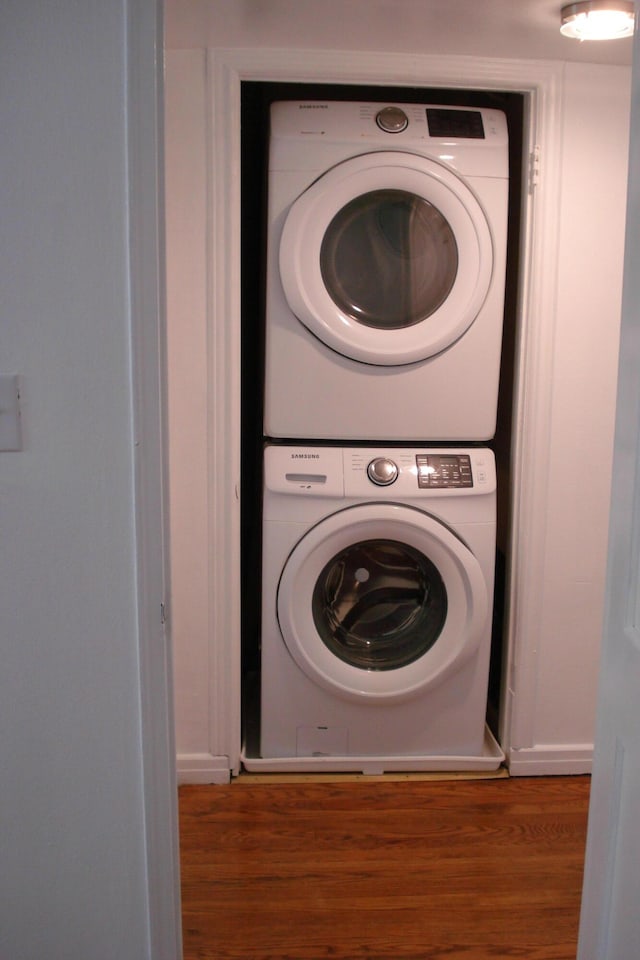 2419 Longview Ave SW Unit 15, Roanoke, VA 24014 - laundry area with estacked washer and dryer and wood finished floors