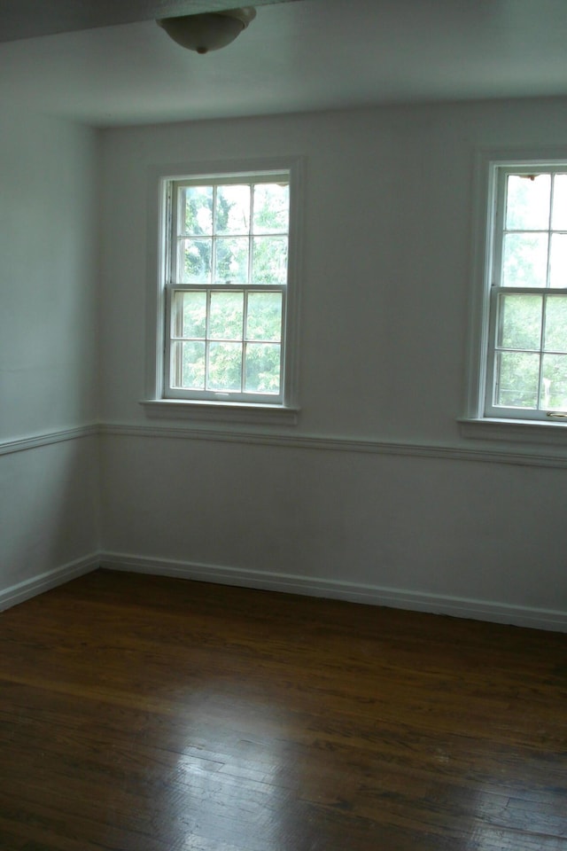 2419 Longview Ave SW Unit 15, Roanoke, VA 24014 - spare room featuring dark wood-style flooring and baseboards