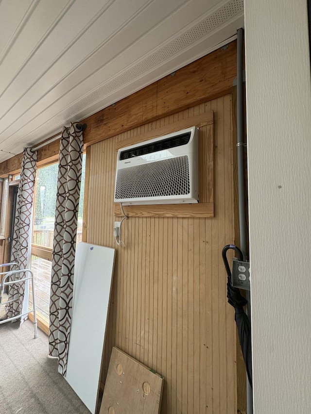 423 Turner Rd, Salem, VA 24153 - detailed view of wood walls, a wall unit AC, and carpet floors