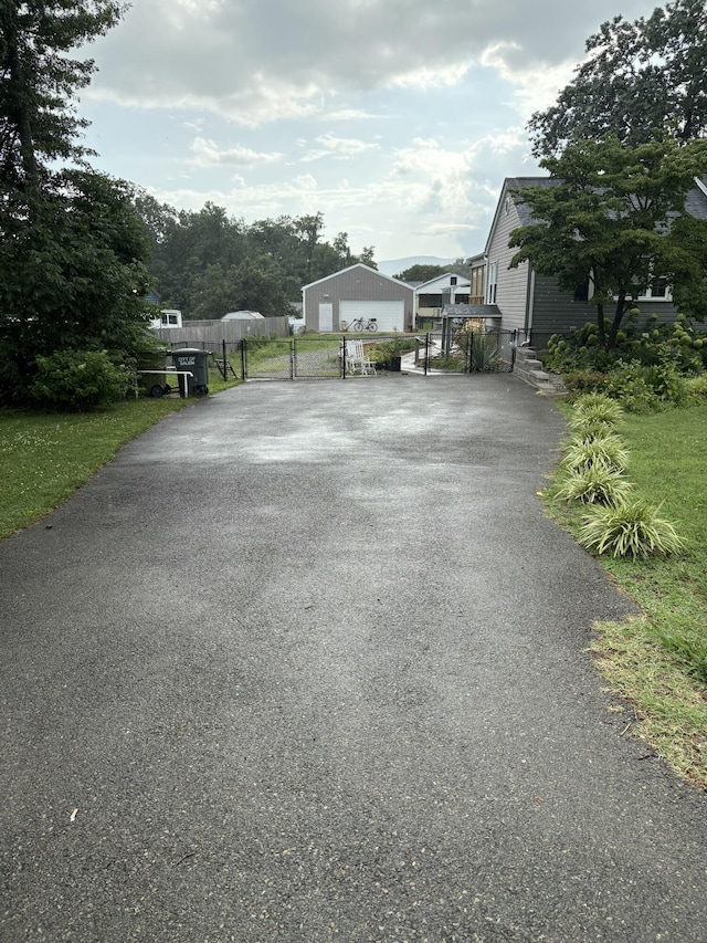 423 Turner Rd, Salem, VA 24153 - view of asphalt driveway with a gate