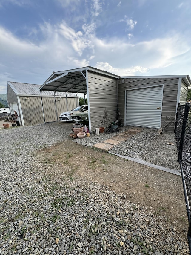 423 Turner Rd, Salem, VA 24153 - garage with gravel driveway and a carport