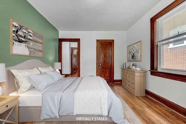 1618 8th St SE, Roanoke, VA 24013 - bedroom featuring wood finished floors and baseboards