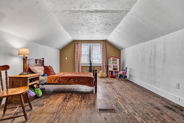 1618 8th St SE, Roanoke, VA 24013 - bedroom featuring hardwood / wood-style floors and vaulted ceiling