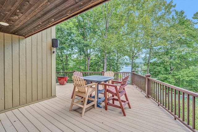 200 Fairway Dr, Penhook, VA 24137 - wooden deck featuring outdoor dining space and view of scattered trees
