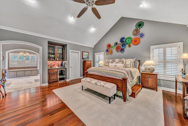 200 Fairway Dr, Penhook, VA 24137 - bedroom featuring beverage cooler, wood finished floors, arched walkways, high vaulted ceiling, and recessed lighting