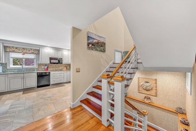 200 Fairway Dr, Penhook, VA 24137 - staircase featuring baseboards and wood finished floors
