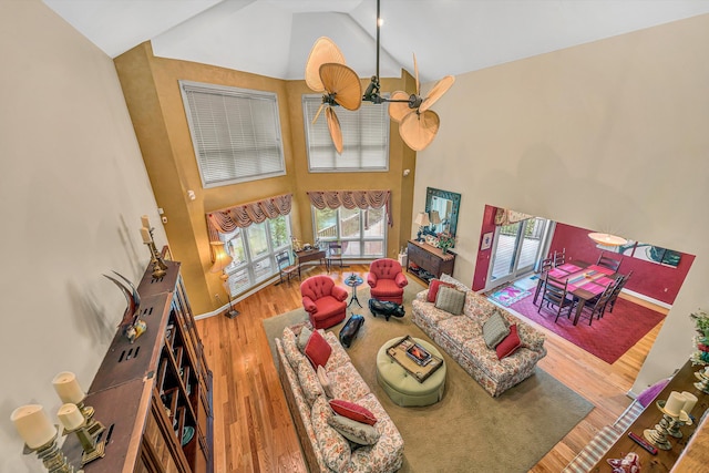 200 Fairway Dr, Penhook, VA 24137 - living area featuring high vaulted ceiling, wood finished floors, a ceiling fan, and baseboards