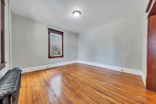 1523 Rorer Ave SW, Roanoke, VA 24016 - empty room with wood finished floors and baseboards