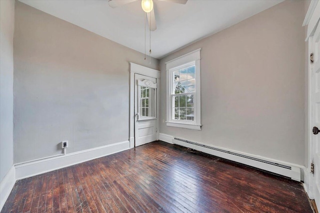 1523 Rorer Ave SW, Roanoke, VA 24016 - unfurnished room featuring a baseboard heating unit, dark wood-style flooring, ceiling fan, and baseboards