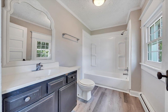 1523 Rorer Ave SW, Roanoke, VA 24016 - bathroom with a textured ceiling, wood finished floors, vanity, a baseboard heating unit, and toilet