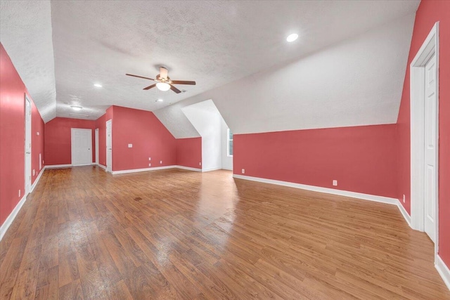 5995 Twine Hollow Rd, Salem, VA 24153 - bonus room with ceiling fan, lofted ceiling, wood finished floors, baseboards, and a textured ceiling