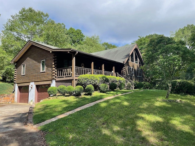 612 Peters Creek Dr, Stuart, VA 24171 - log-style house with log exterior, a front lawn, driveway, and a garage