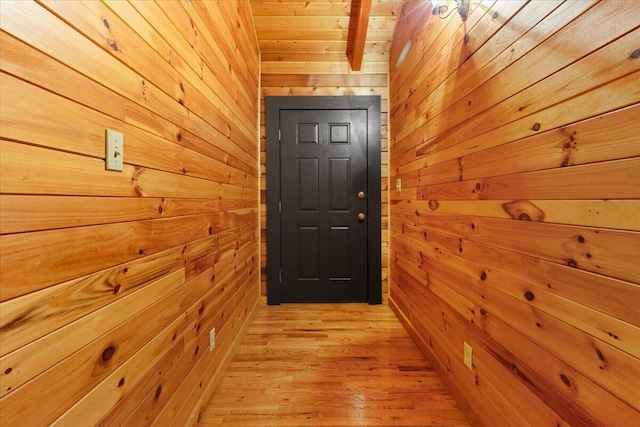612 Peters Creek Dr, Stuart, VA 24171 - doorway with wood walls, wooden ceiling, and light wood-type flooring