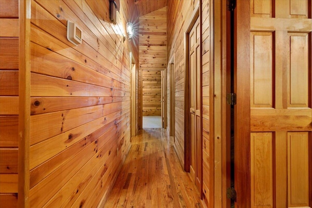612 Peters Creek Dr, Stuart, VA 24171 - corridor featuring wooden walls and light wood-style flooring