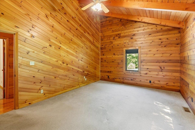 612 Peters Creek Dr, Stuart, VA 24171 - carpeted empty room with wooden walls, ceiling fan, and wood ceiling