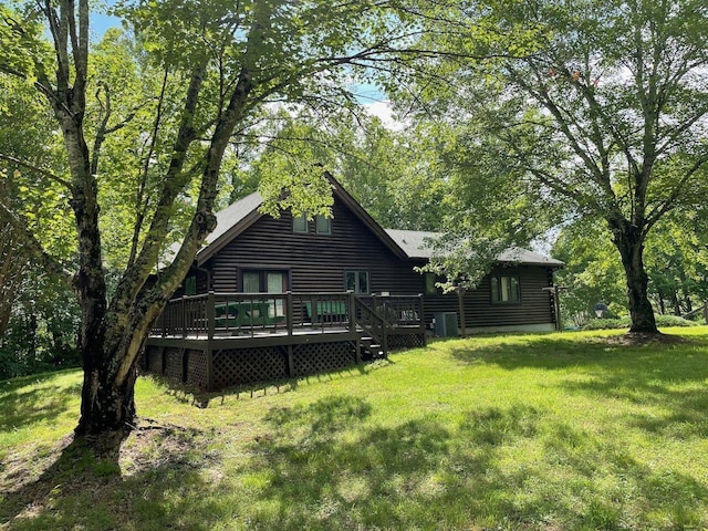 612 Peters Creek Dr, Stuart, VA 24171 - rear view of property featuring a deck, a lawn, and log exterior