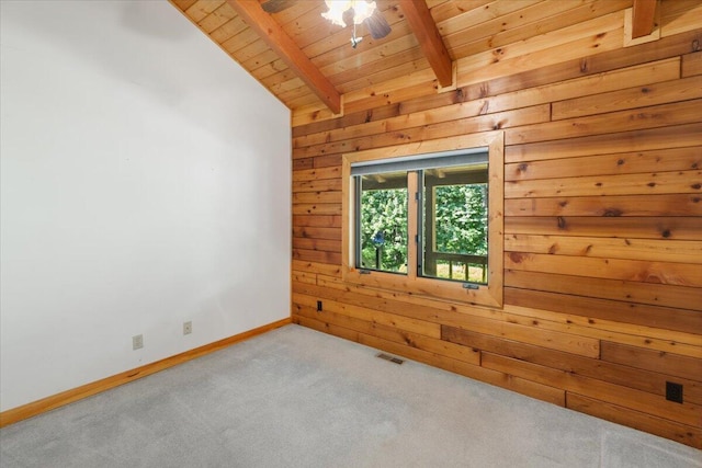 612 Peters Creek Dr, Stuart, VA 24171 - unfurnished room with a wooden ceiling with exposed beams, wooden walls, and carpet flooring