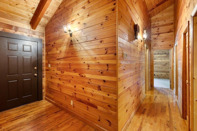 612 Peters Creek Dr, Stuart, VA 24171 - hallway with wooden walls, wooden ceiling, and light wood-type flooring