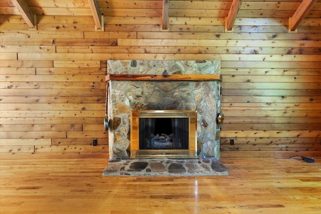 612 Peters Creek Dr, Stuart, VA 24171 - detailed view of wood finished floors, a fireplace, and wooden walls