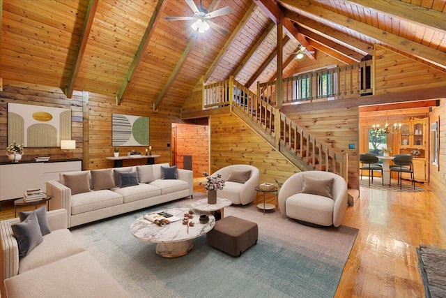 612 Peters Creek Dr, Stuart, VA 24171 - living area featuring wood walls, hardwood / wood-style floors, a ceiling fan, high vaulted ceiling, and a wood ceiling with exposed beams