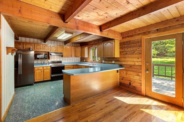 612 Peters Creek Dr, Stuart, VA 24171 - kitchen featuring stainless steel refrigerator with ice dispenser, range with electric cooktop, black microwave, under cabinet range hood, and a wood ceiling with exposed beams