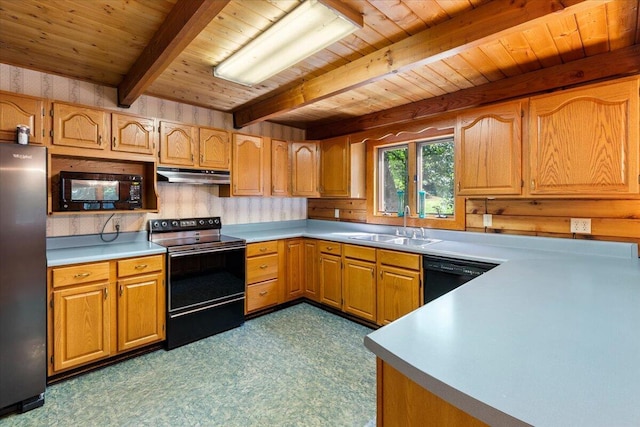 612 Peters Creek Dr, Stuart, VA 24171 - kitchen with black appliances, under cabinet range hood, dark flooring, a wood ceiling with exposed beams, and light countertops
