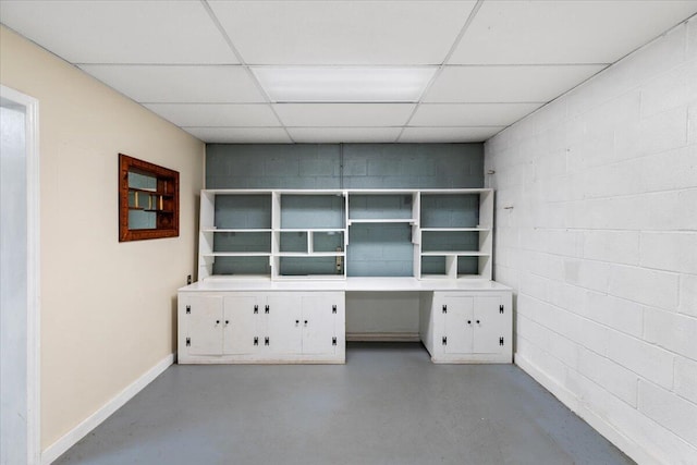 612 Peters Creek Dr, Stuart, VA 24171 - unfurnished office featuring a paneled ceiling, concrete block wall, and finished concrete flooring