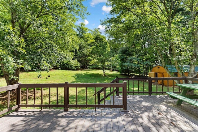 612 Peters Creek Dr, Stuart, VA 24171 - deck featuring a lawn and a storage shed
