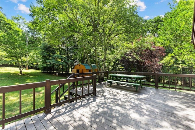 612 Peters Creek Dr, Stuart, VA 24171 - wooden deck with a playground, a lawn, outdoor dining area, and view of scattered trees