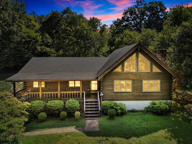 612 Peters Creek Dr, Stuart, VA 24171 - log-style house with log exterior and a front lawn