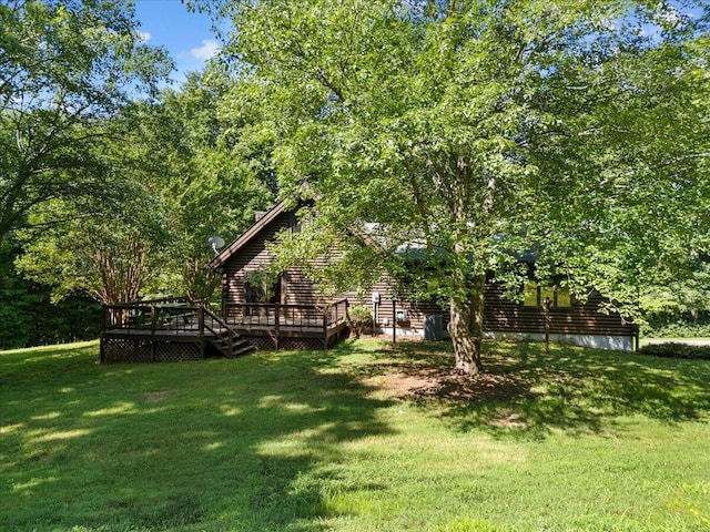 612 Peters Creek Dr, Stuart, VA 24171 - view of green lawn with a deck