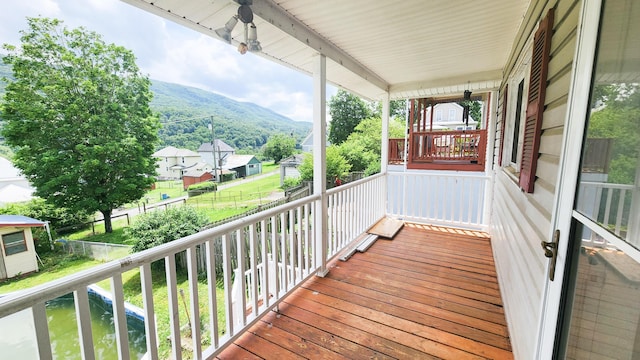 611 Alleghany St, Clifton Forge, VA 24422 - wooden porch featuring a residential view
