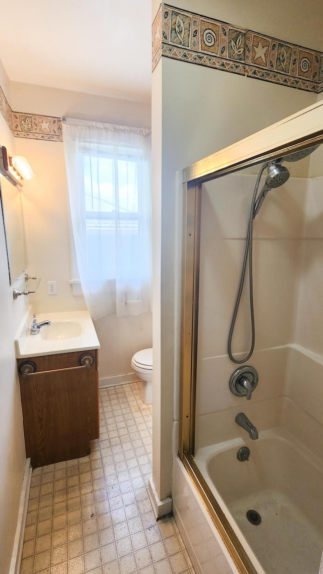 611 Alleghany St, Clifton Forge, VA 24422 - full bath featuring toilet, vanity, bathtub / shower combination, and baseboards