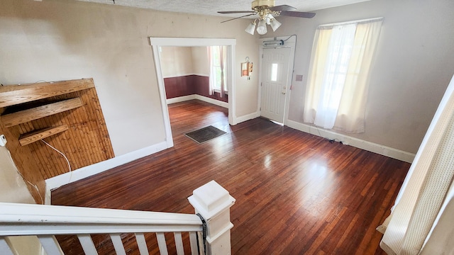 611 Alleghany St, Clifton Forge, VA 24422 - foyer entrance with ceiling fan, wood finished floors, plenty of natural light, and baseboards