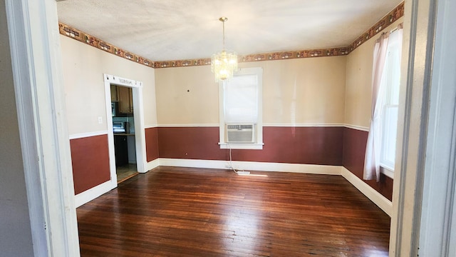 611 Alleghany St, Clifton Forge, VA 24422 - spare room with hardwood / wood-style floors, a chandelier, and baseboards