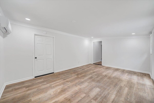 496 Boyd St, Buchanan, VA 24066 - unfurnished room featuring a wall unit AC, light wood-style floors, crown molding, and recessed lighting