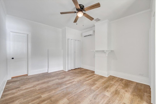 496 Boyd St, Buchanan, VA 24066 - spare room featuring an AC wall unit, ceiling fan, light wood-type flooring, and crown molding