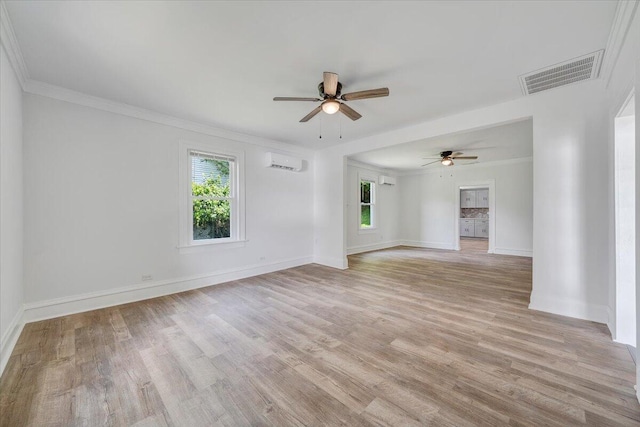 496 Boyd St, Buchanan, VA 24066 - spare room featuring a ceiling fan, a wall unit AC, light wood-type flooring, and crown molding