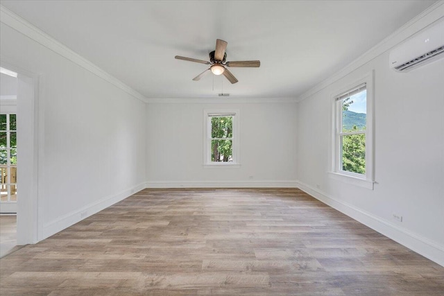 496 Boyd St, Buchanan, VA 24066 - empty room with a wall unit AC, plenty of natural light, crown molding, and wood finished floors